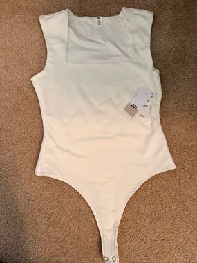 bp White Ribbed One-Piece Bodysuit with square neckline. Soft and stretcy